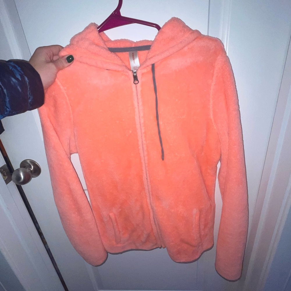 Bright orange fleece jacket